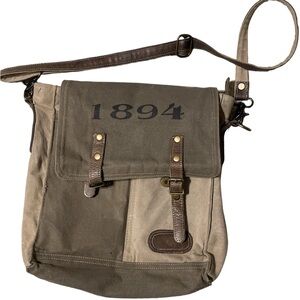 Myra 1894 heavy canvas messenger bag. Adjustable strap. No outer tears in canvas